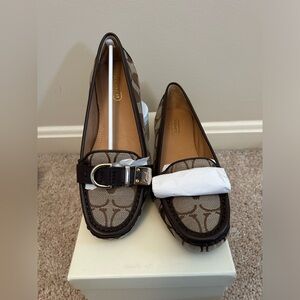 Never used before, in box/ OG packaging size 5.5 coach Flores shoes in khaki.